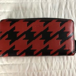 Coach red and black wallet. Comes from a smoke and pet free home.